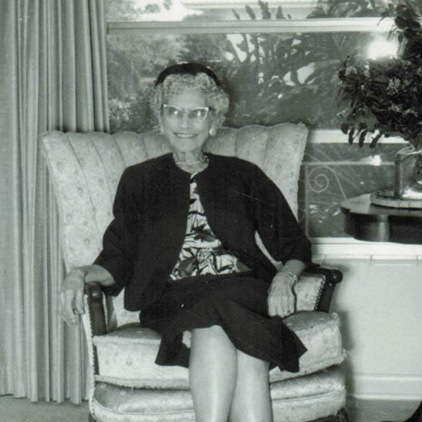 HiLu lounging in a chair in the 1950s.